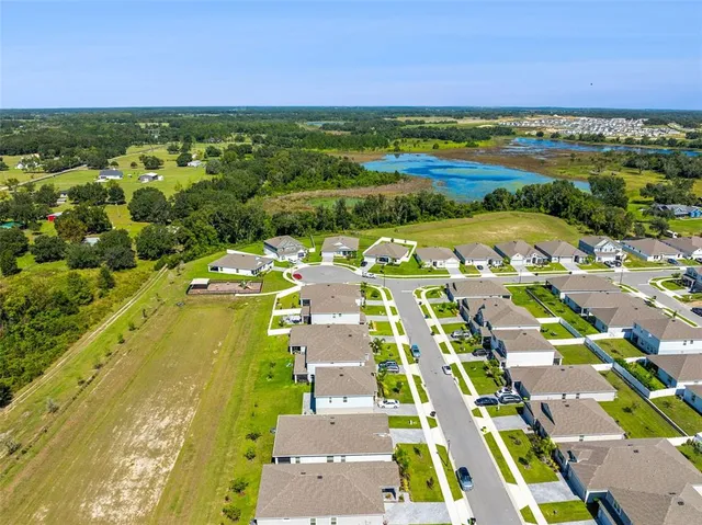a view of city with ocean