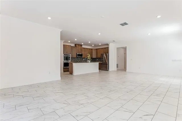 a view of a kitchen with a sink