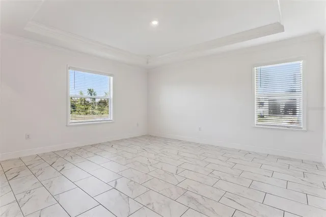 an empty room with windows