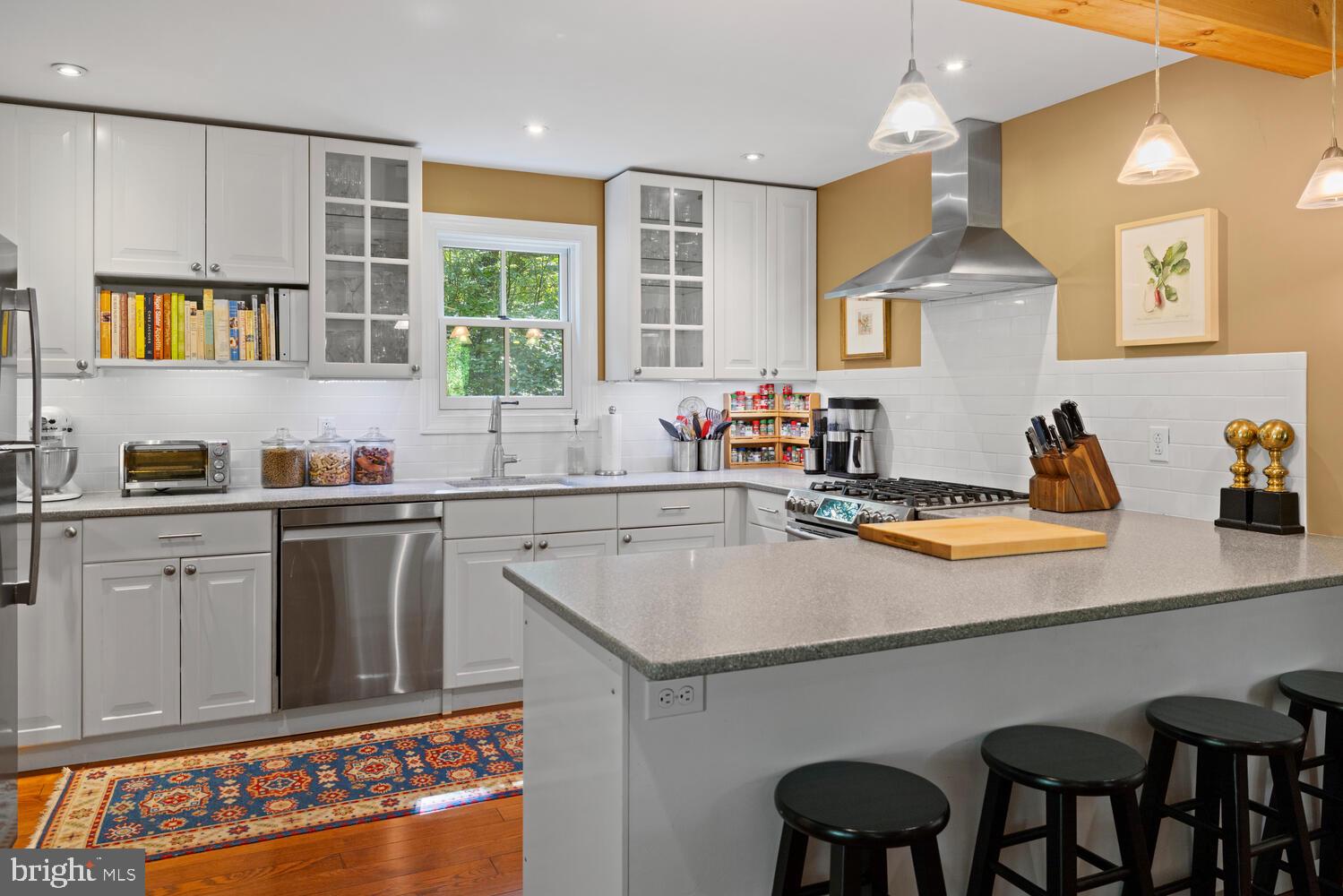 7 Walt Lane Wyncote, PA 19095 - Photo 11 of 44 a kitchen with a sink cabinets and wooden floor