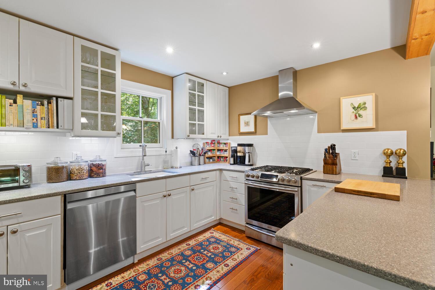 7 Walt Lane Wyncote, PA 19095 - Photo 12 of 44 a kitchen with a sink stove and cabinets