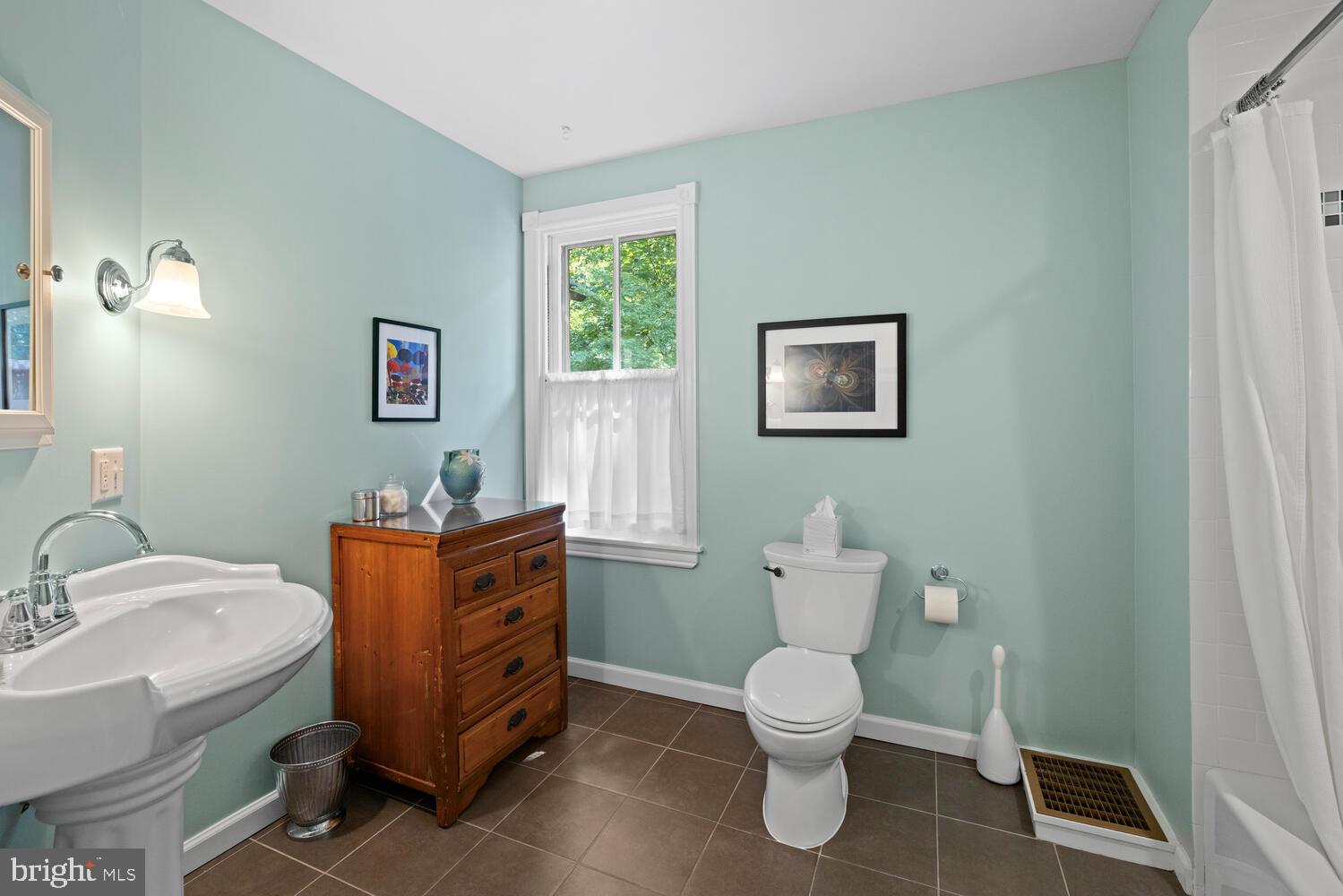 7 Walt Lane Wyncote, PA 19095 - Photo 20 of 44 a bathroom with a toilet sink and mirror