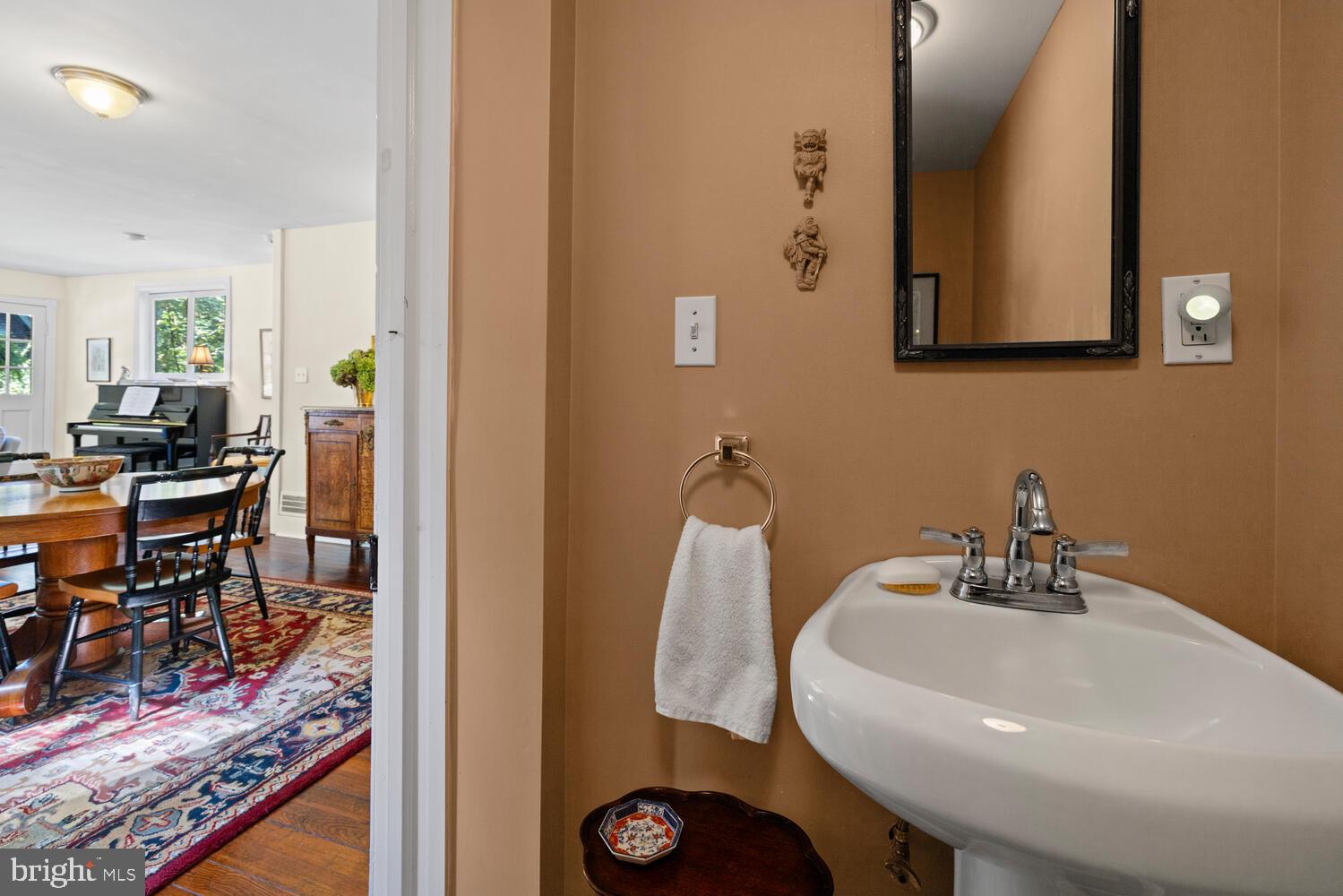 7 Walt Lane Wyncote, PA 19095 - Photo 28 of 44 a bathroom with a sink and a mirror