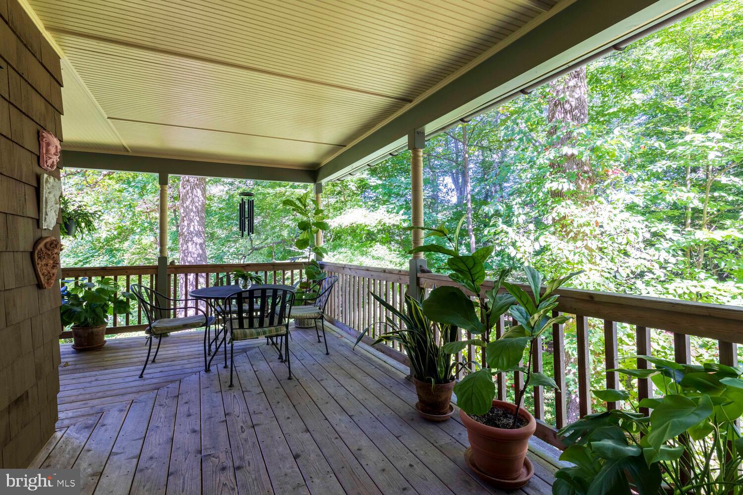 7 Walt Lane Wyncote, PA 19095 - Photo 30 of 44 a view of a porch with furniture and wooden floor