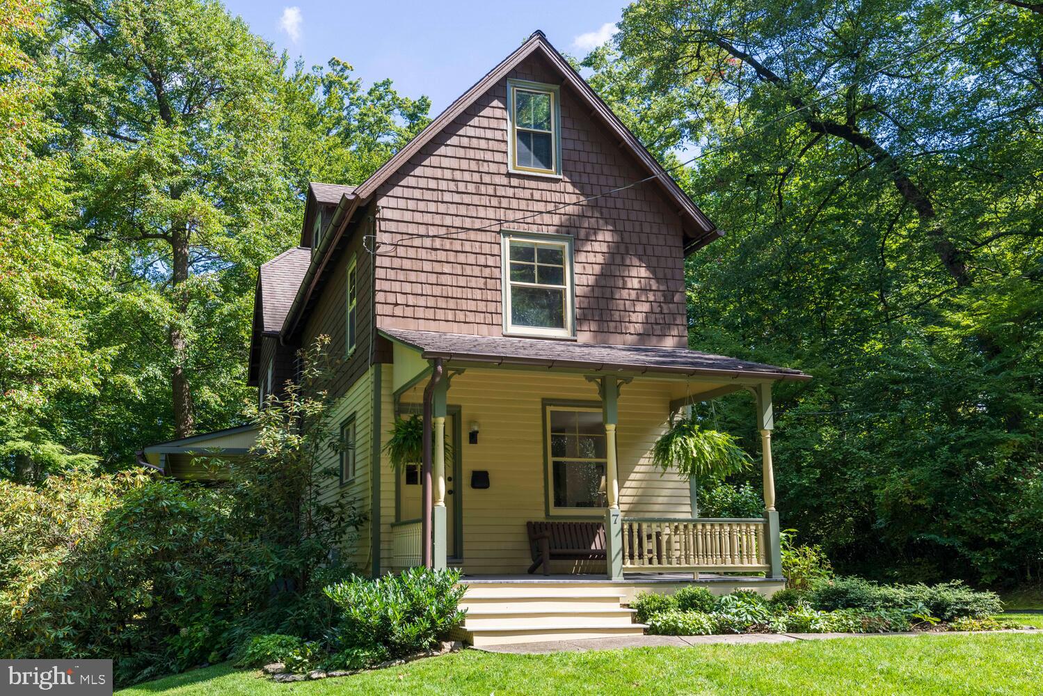 7 Walt Lane Wyncote, PA 19095 - Photo 41 of 44 a view of a house in front of a yard with plants and large trees