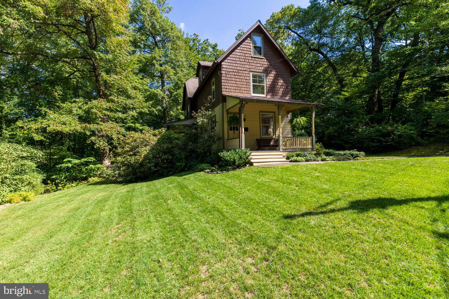 7 Walt Lane Wyncote, PA 19095 - Photo 42 of 44 front view of a house with a yard