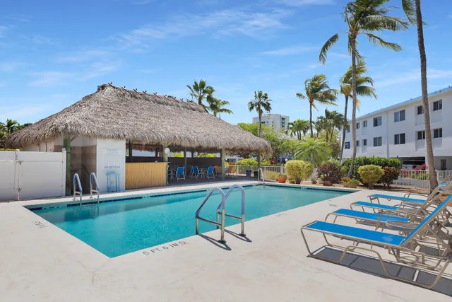 a view of a swimming pool with a patio