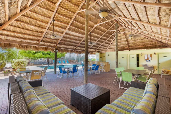 a outdoor living space with furniture and a couch