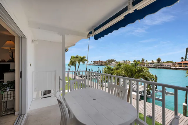 a view of balcony with furniture