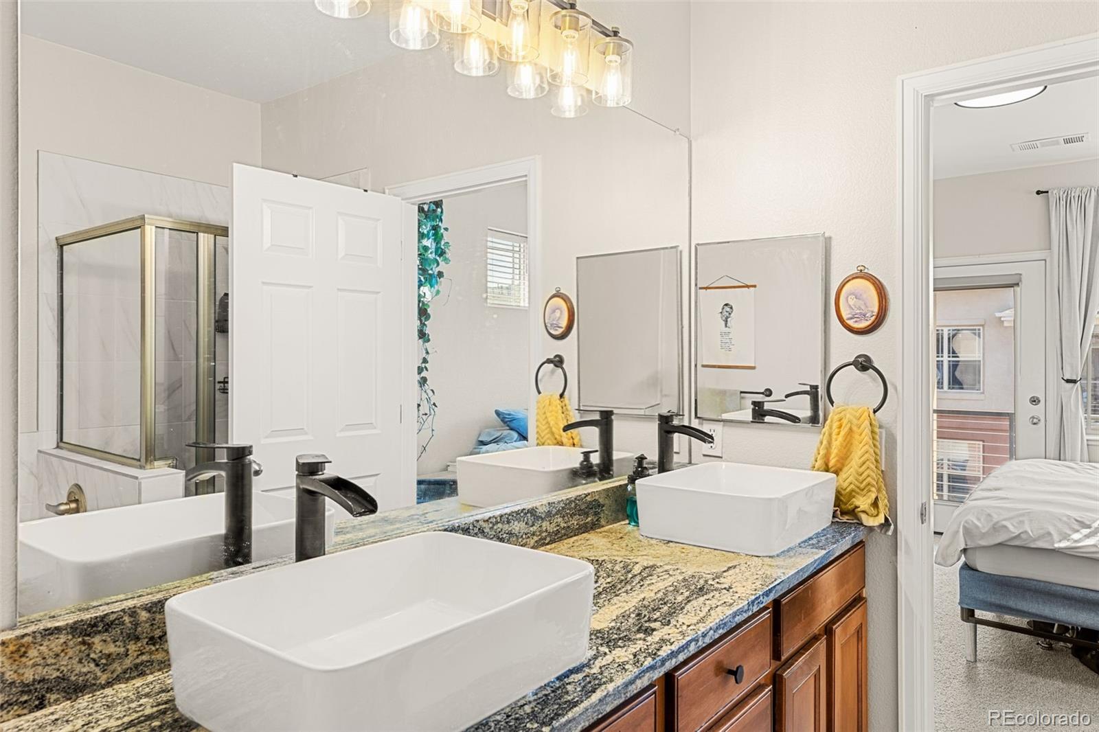 8073 West 51st Place, Unit 303 Arvada, CO 80002 - Photo 30 of 48 a view of a kitchen area with granite countertop living room and living room