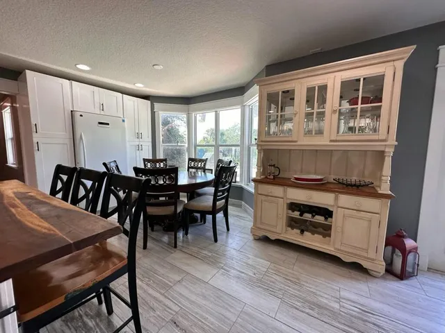 a room with a dresser and a mirror