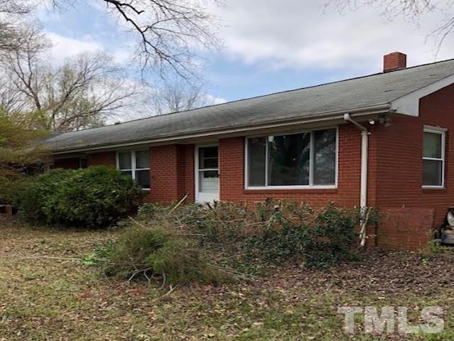 a house that has a lot of plants in it