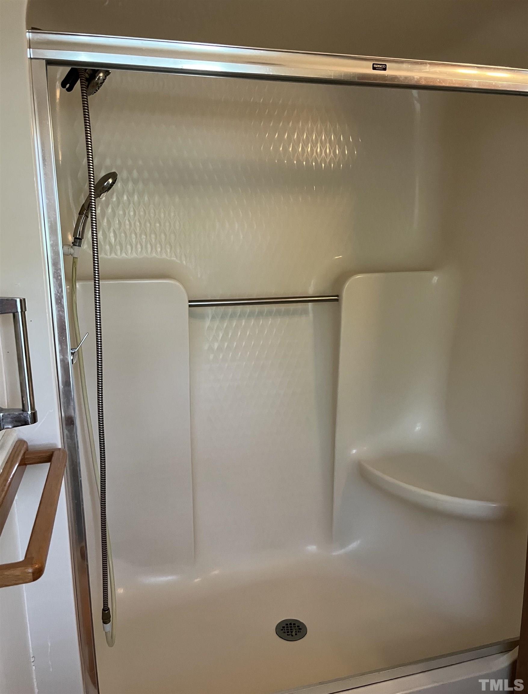 2171 Bud Lipscomb Road Willow Spring, NC 27592 - Photo 11 of 20 a bathroom with a shower