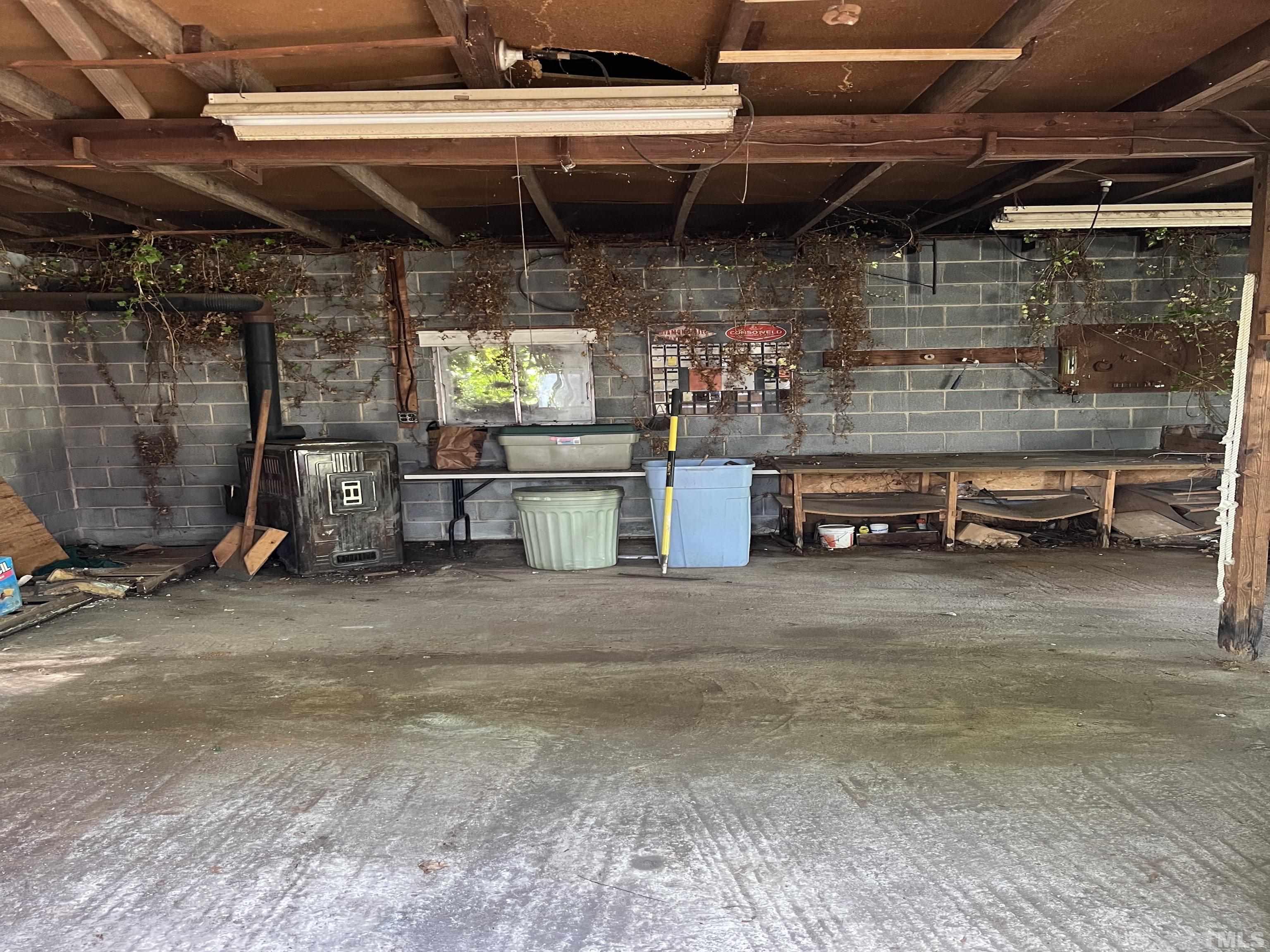 2171 Bud Lipscomb Road Willow Spring, NC 27592 - Photo 19 of 20 a view of storage and utility room