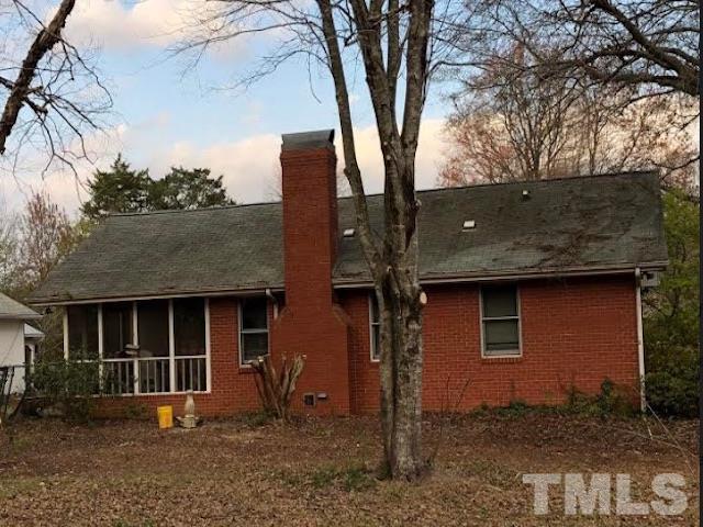 2171 Bud Lipscomb Road Willow Spring, NC 27592 - Photo 3 of 20 a front view of a house with garden