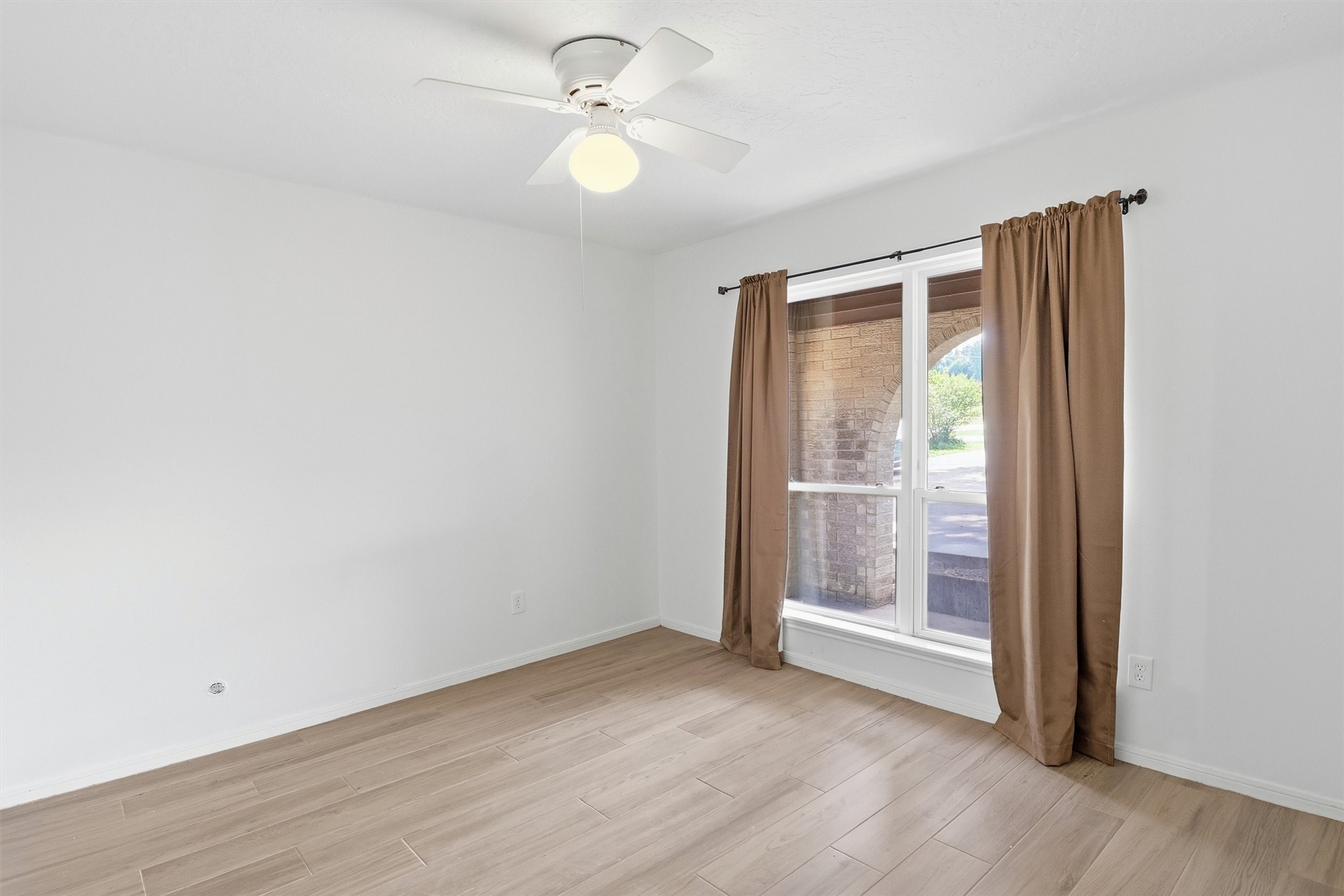 22923 Tomball Cemetery Road Tomball, TX 77377 - Photo 26 of 50 This secondary bedroom is light, bright and spacious.