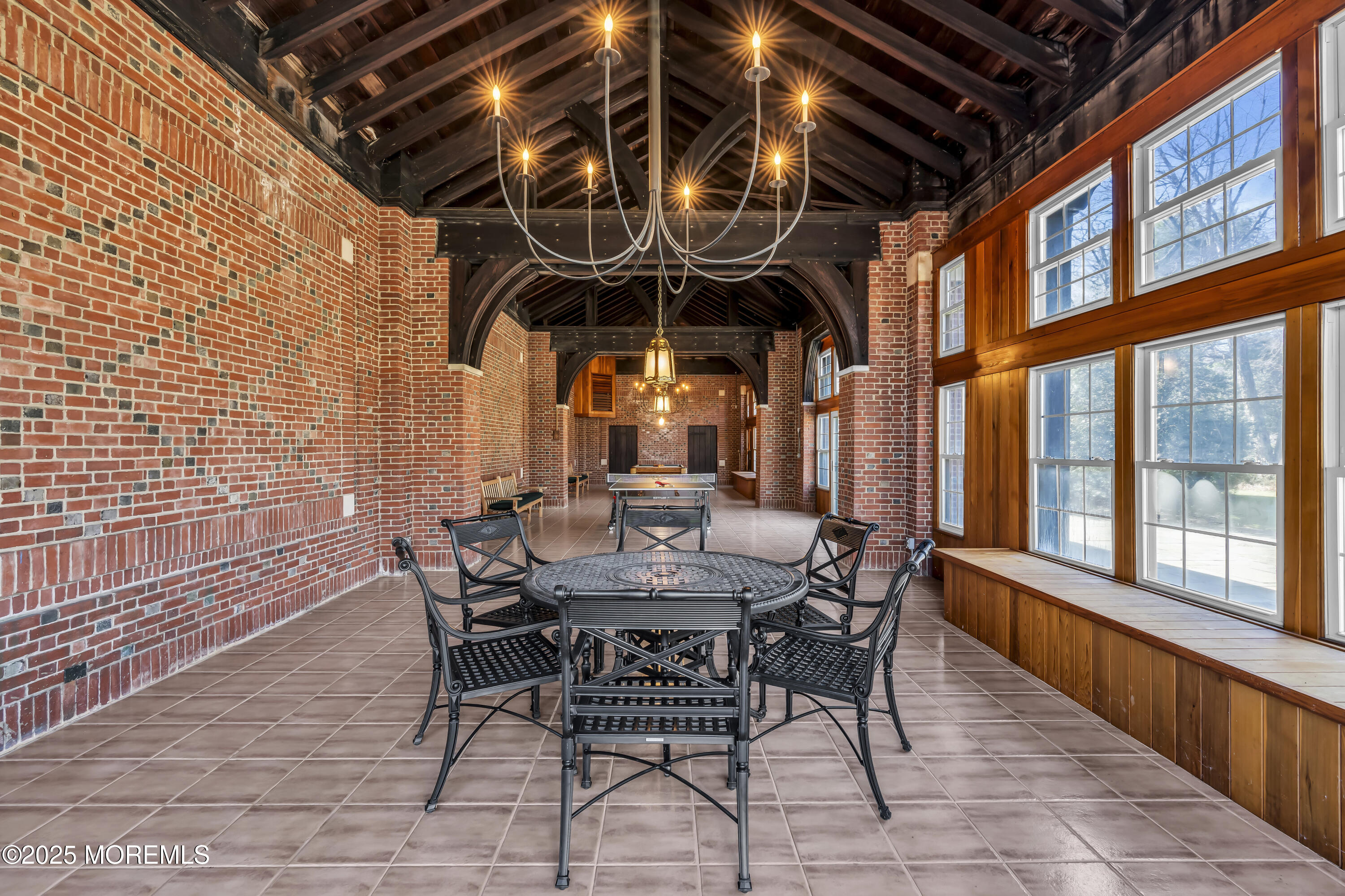 66 A West River Road Rumson, NJ 07760 - Photo 11 of 34 a view of a outdoor space with table and chairs