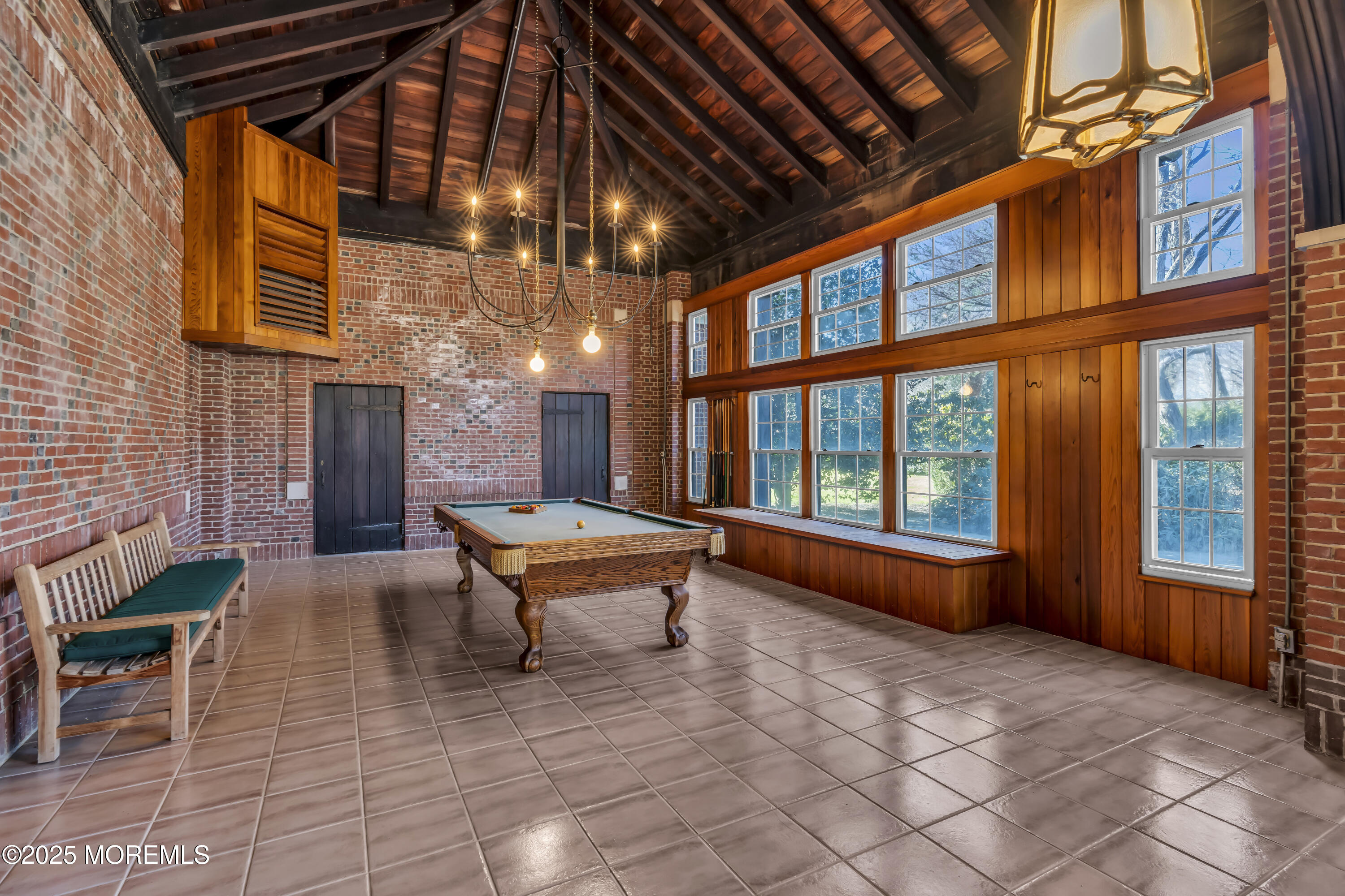 66 A West River Road Rumson, NJ 07760 - Photo 12 of 34 a backyard of a house with outdoor seating