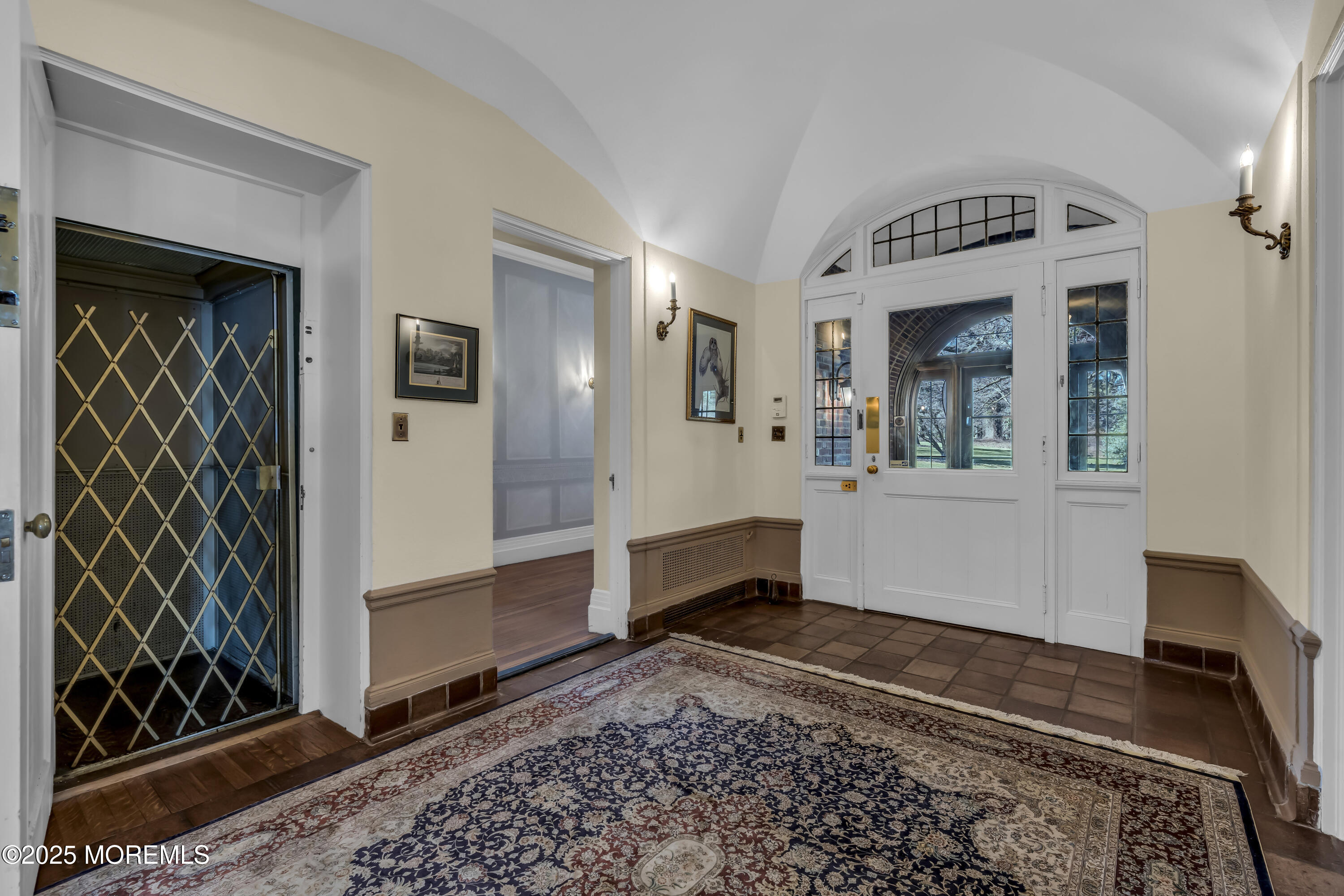 66 A West River Road Rumson, NJ 07760 - Photo 13 of 34 a view of a hallway with entryway and wooden floor