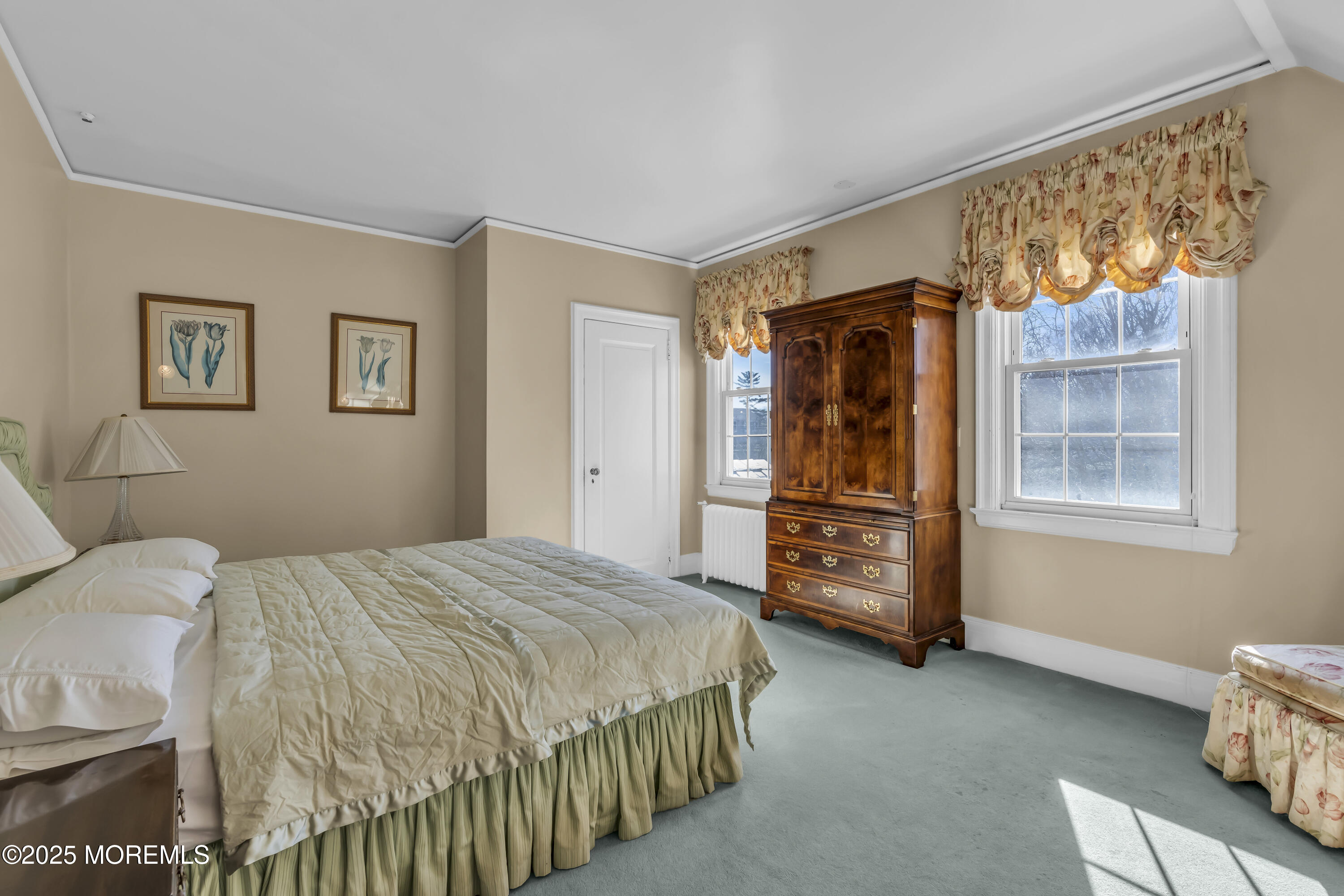 66 A West River Road Rumson, NJ 07760 - Photo 26 of 34 a bedroom with a bed and a window