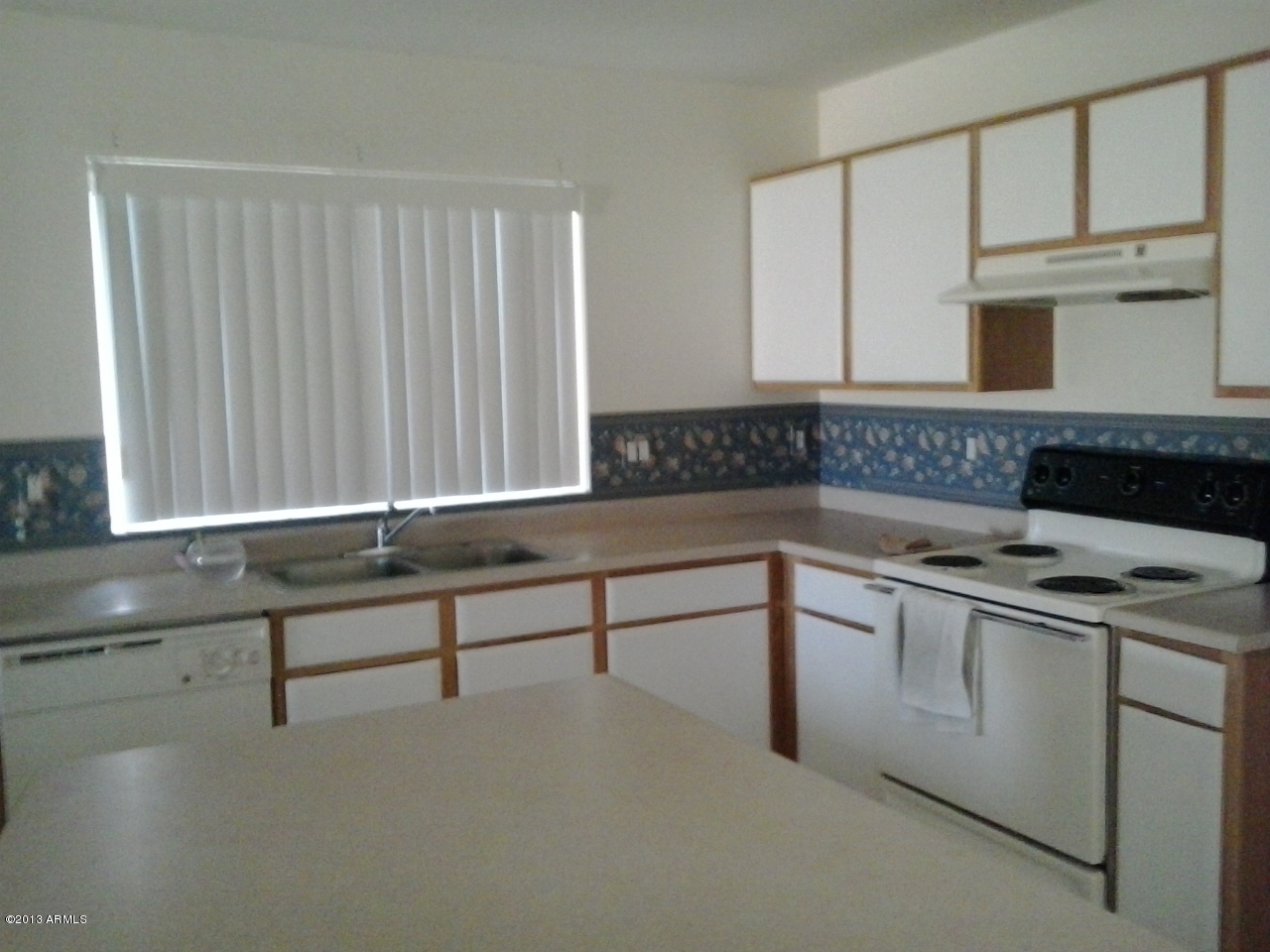 3128 West Alta Vista Road Phoenix, AZ 85041 - Photo 2 of 3 kitchen