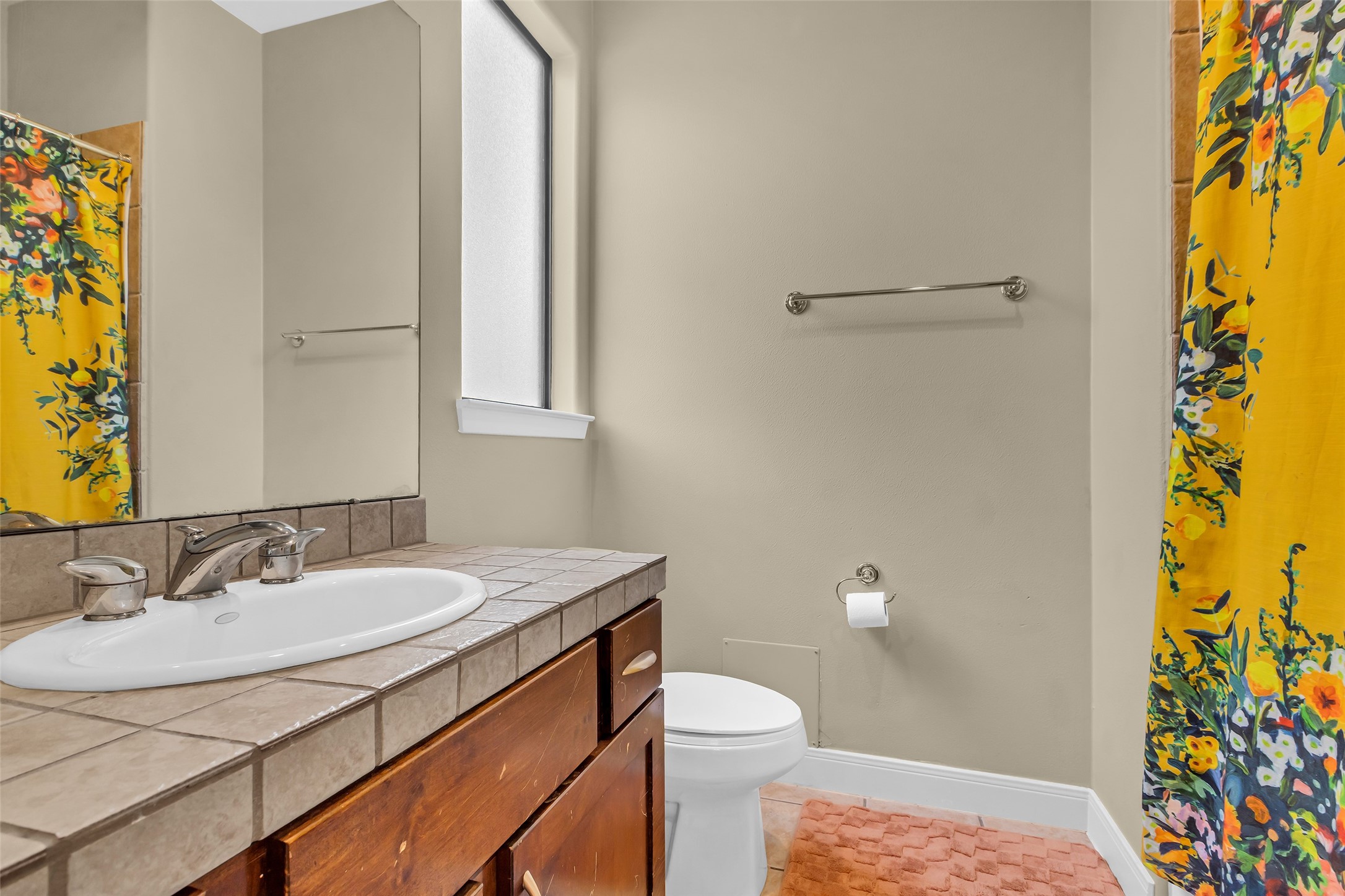 2413 Ralph Street, Unit 2 Houston, TX 77006 - Photo 17 of 26 a bathroom with a sink and a mirror