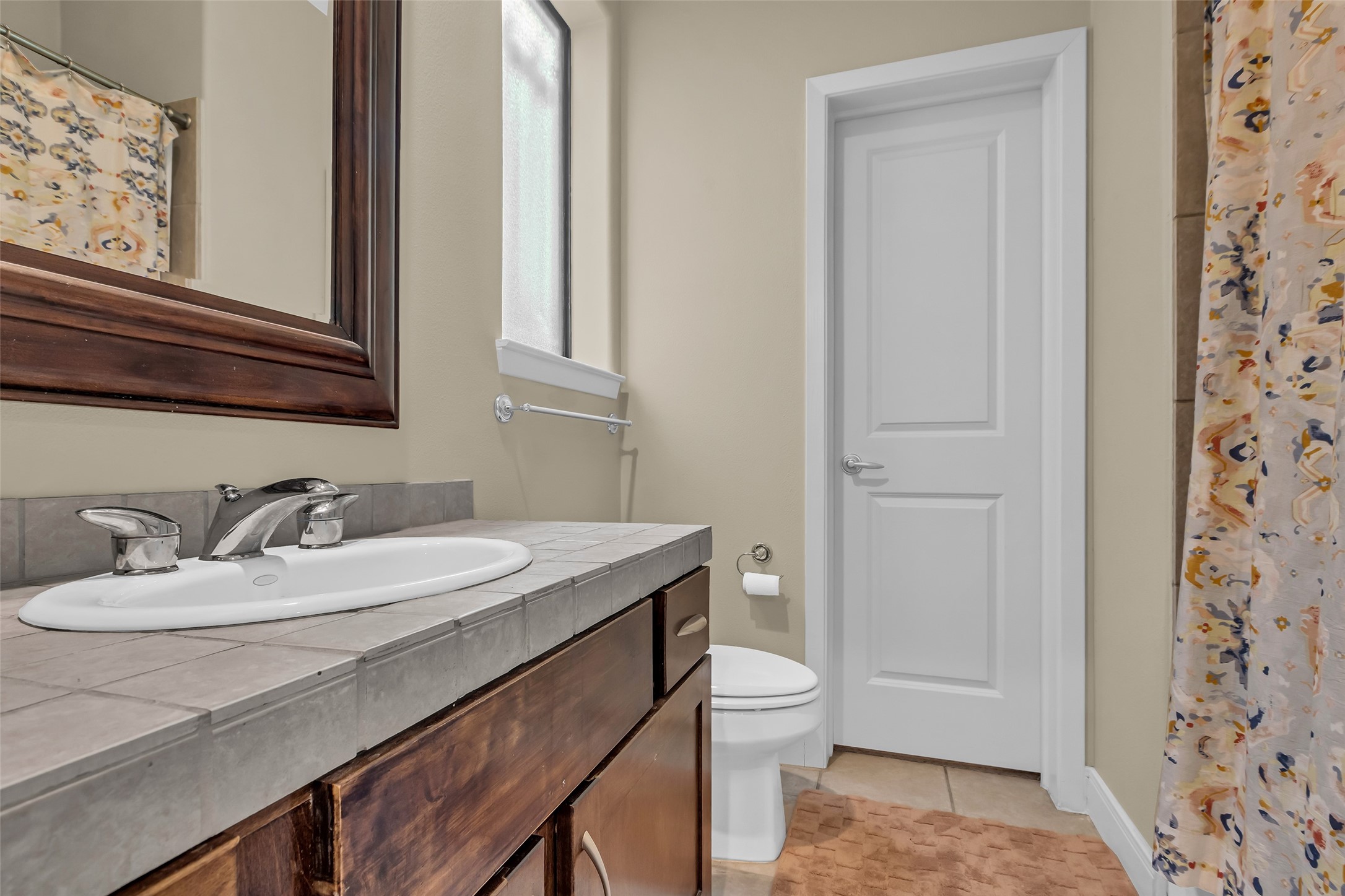 2413 Ralph Street, Unit 2 Houston, TX 77006 - Photo 20 of 26 a bathroom with a sink and a mirror