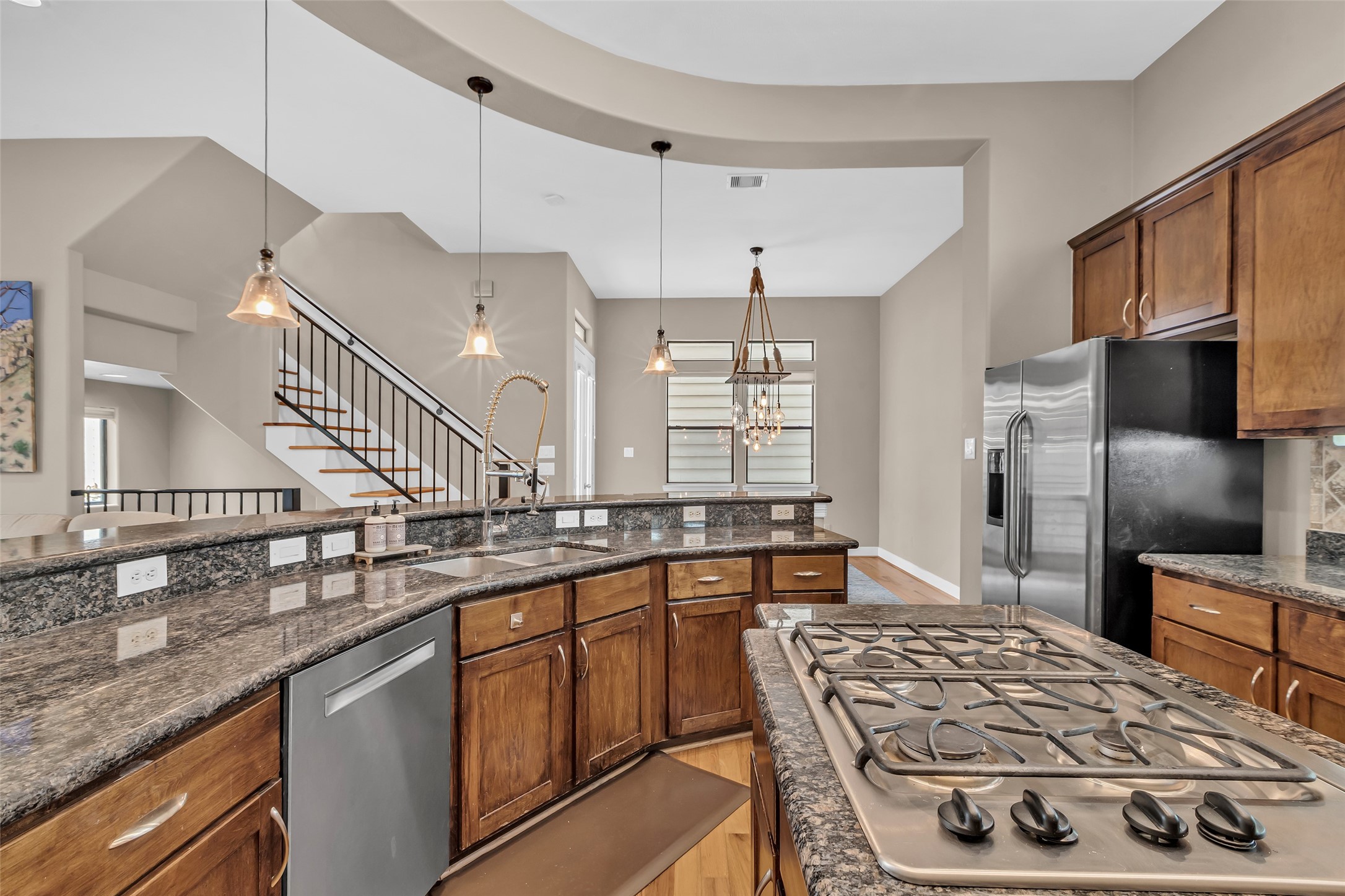 2413 Ralph Street, Unit 2 Houston, TX 77006 - Photo 6 of 26 a kitchen with stainless steel appliances a sink stove and refrigerator