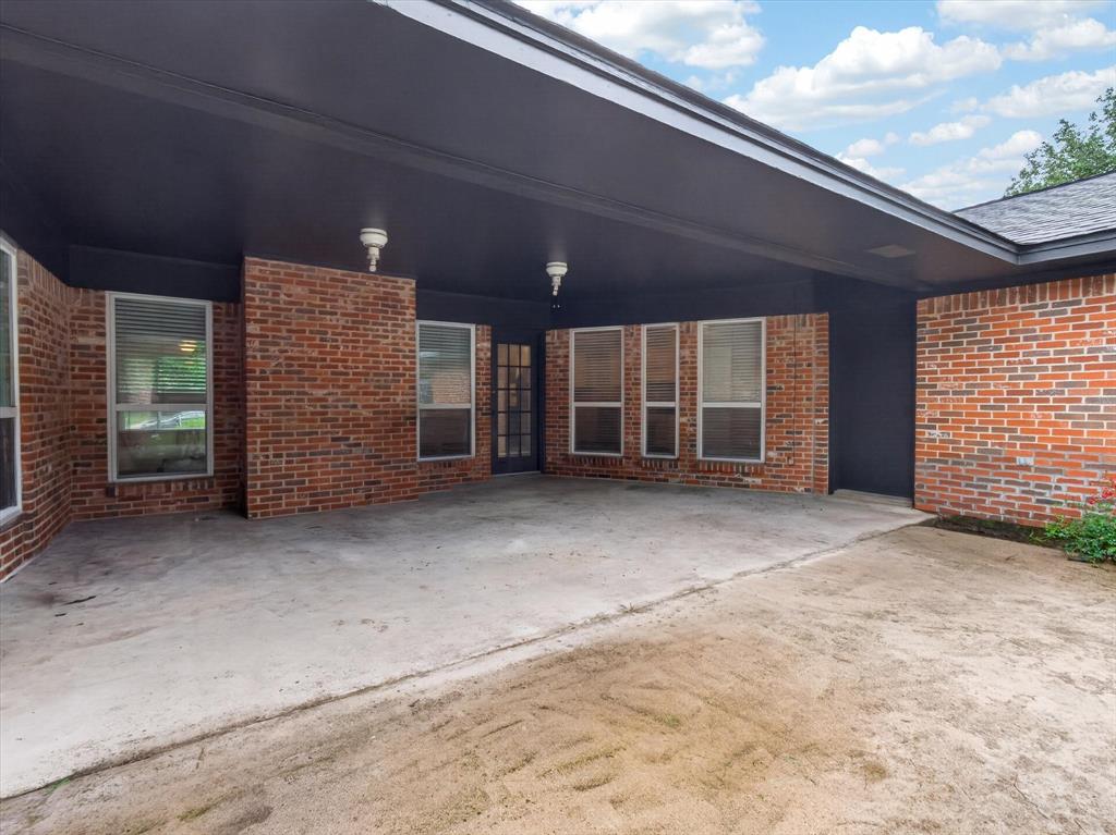 3209 Broken Arrow Road Denton, TX 76209 - Photo 33 of 39 Access from owners suite and livingroom