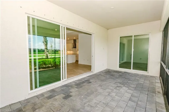a view of a city street from a balcony