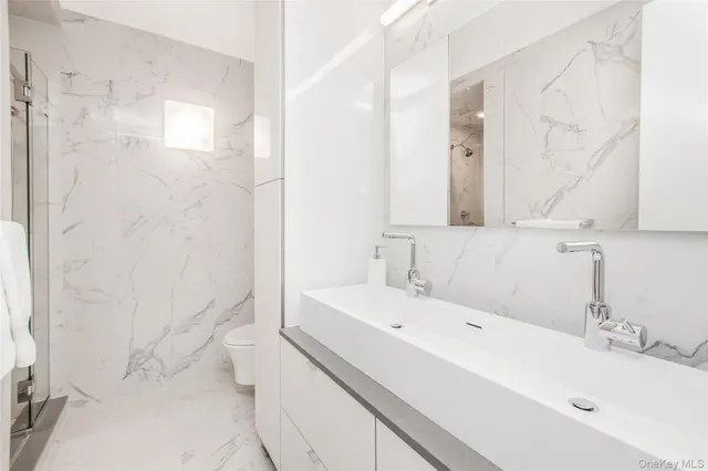 a bathroom with a sink and a bathtub