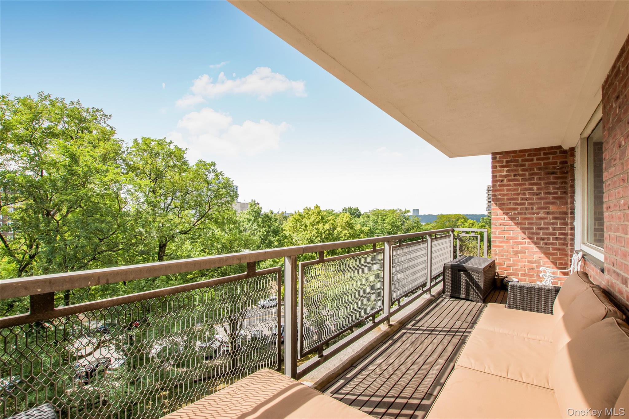 3777 Independence Avenue, Unit 7H Bronx, NY 10463 - Photo 7 of 26 a view of a balcony with wooden floor