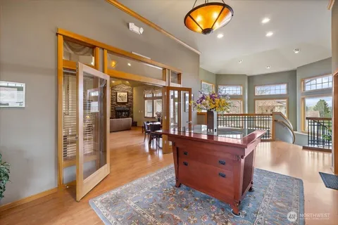 a view of a patio with table and chairs and potted plants