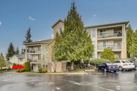 a view of a building with a garden