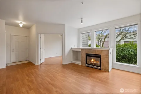 a kitchen with a refrigerator sink and stove