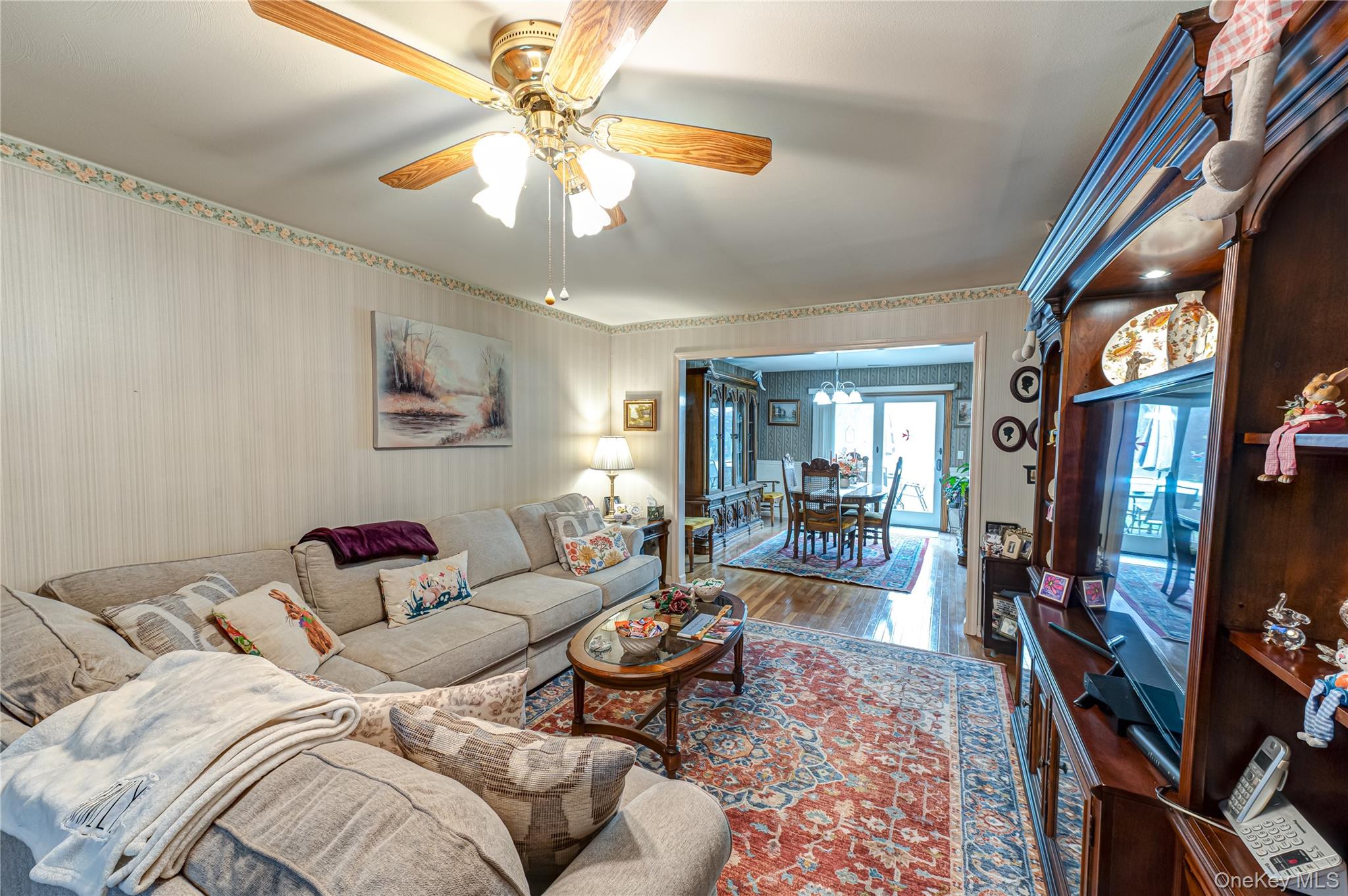12 Blue Point Road East, Unit 12 Holtsville, NY 11742 - Photo 9 of 20 a living room with furniture