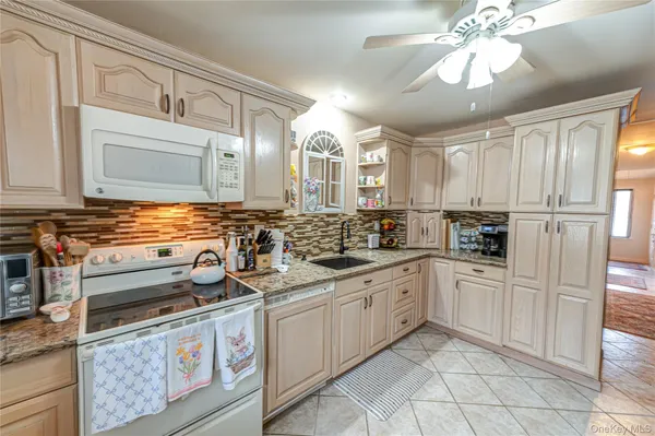 a large kitchen with a large window