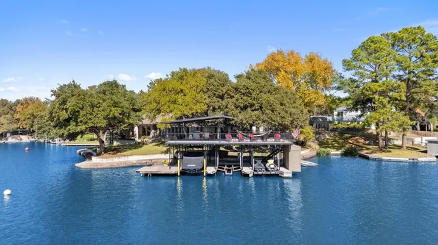 a small pool with a table and chairs
