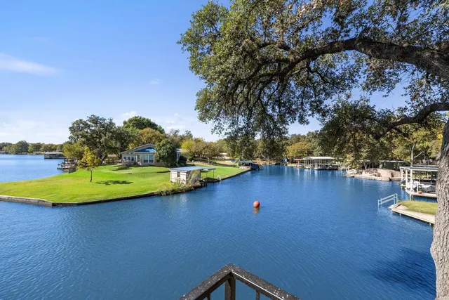 a view of a swimming pool with an outdoor space and seating area