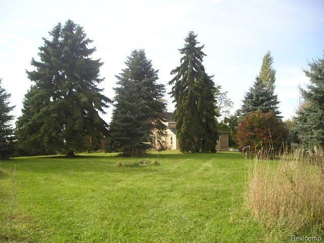 5042 Lahring Road Linden, MI 48451 - Photo 10 of 12 Nice Pine Trees
