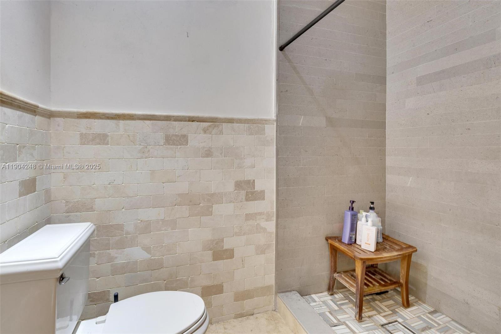 23051 Southwest 153rd Court Miami, FL 33170 - Photo 13 of 33 a bathroom with a toilet a sink and a mirror