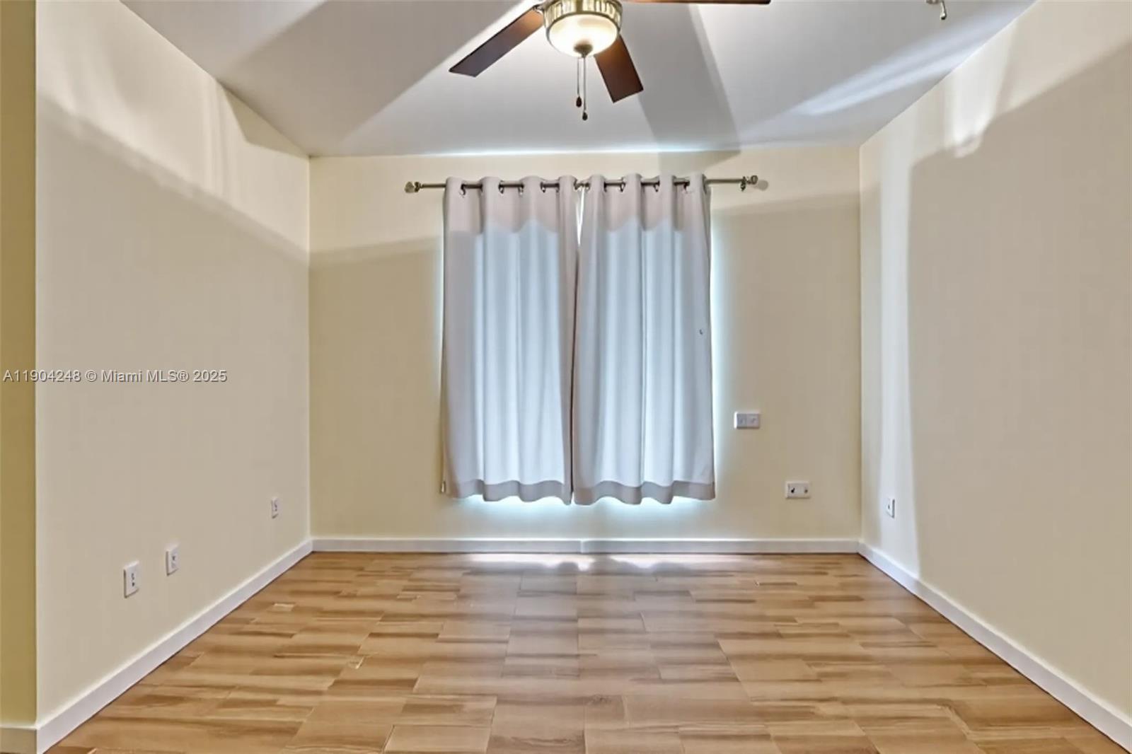 23051 Southwest 153rd Court Miami, FL 33170 - Photo 14 of 33 a view of a room with wooden floor