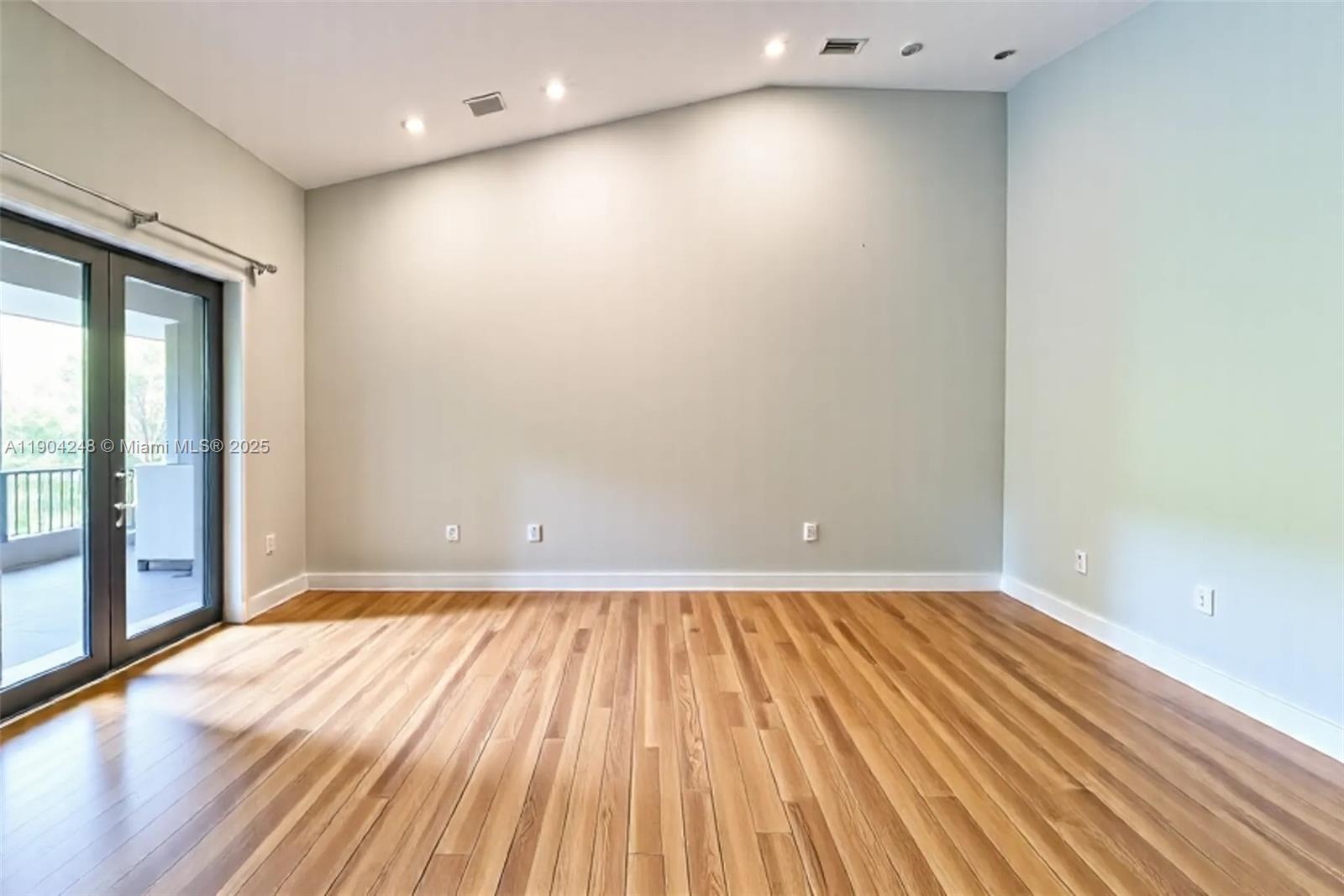23051 Southwest 153rd Court Miami, FL 33170 - Photo 20 of 33 a view of a room with wooden floor and brick walls