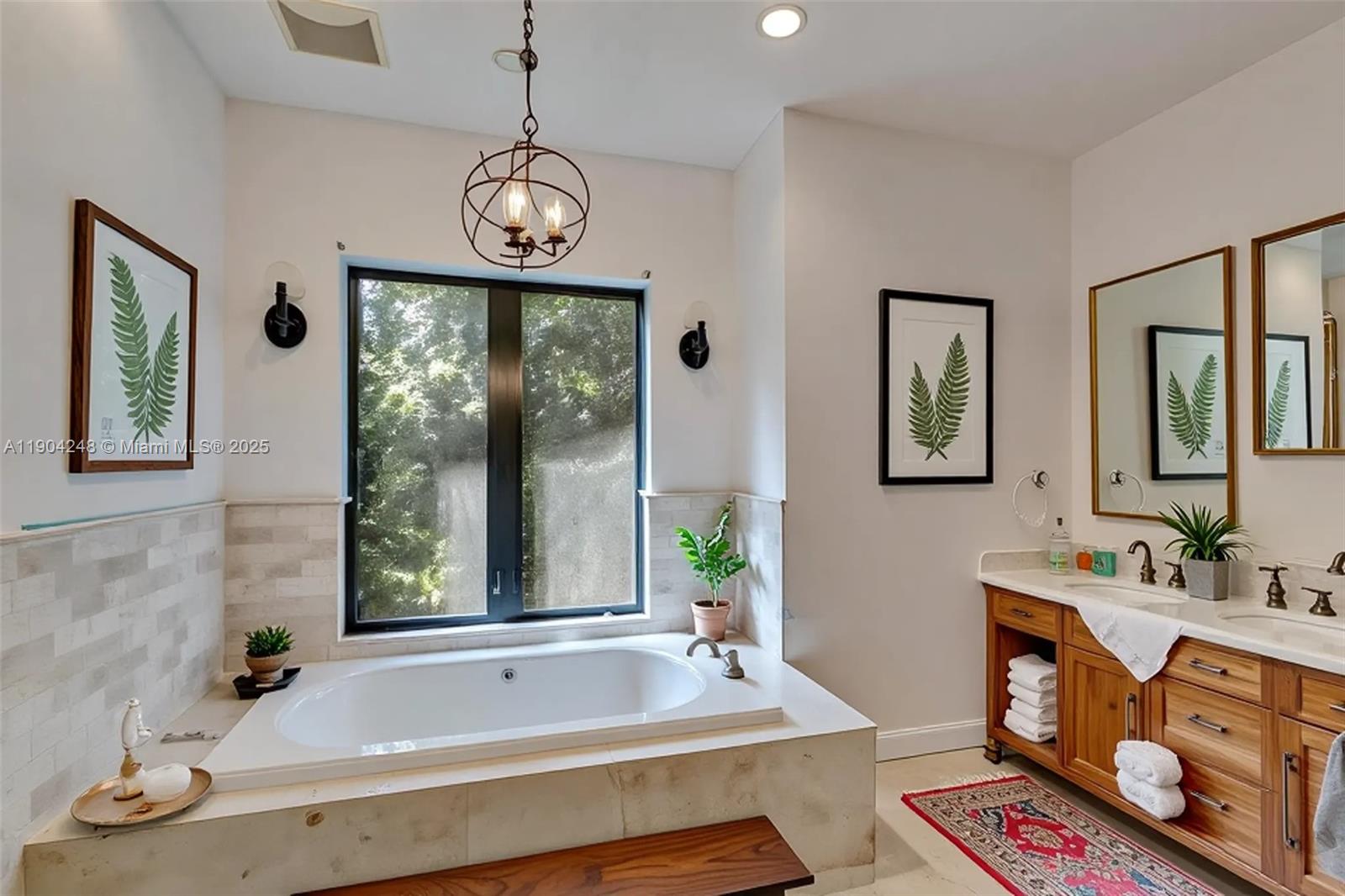 23051 Southwest 153rd Court Miami, FL 33170 - Photo 25 of 33 a bathroom with a bathtub and a sink