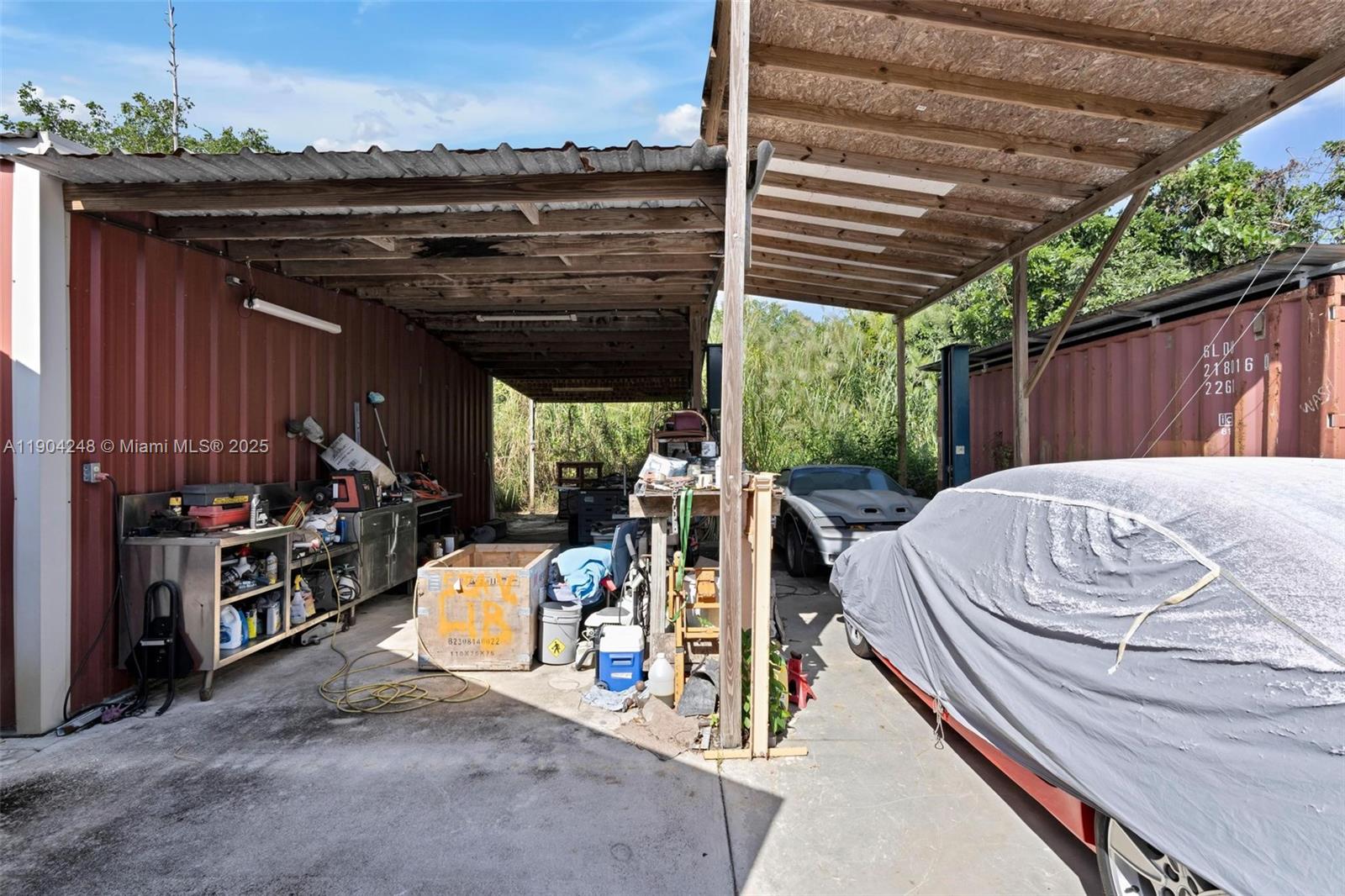 23051 Southwest 153rd Court Miami, FL 33170 - Photo 26 of 33 a view of a chairs and table in patio