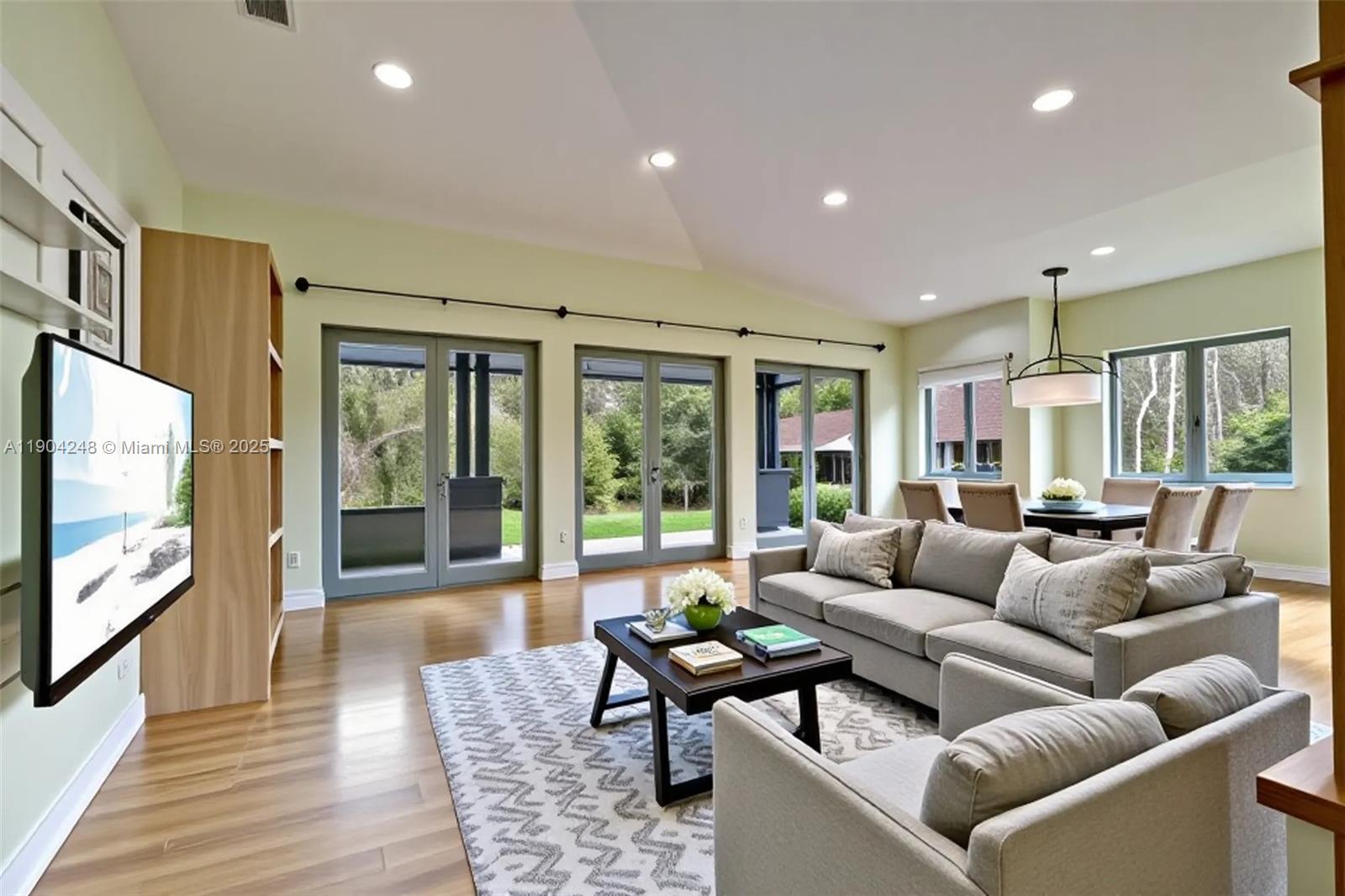 23051 Southwest 153rd Court Miami, FL 33170 - Photo 8 of 33 a living room with furniture and a flat screen tv