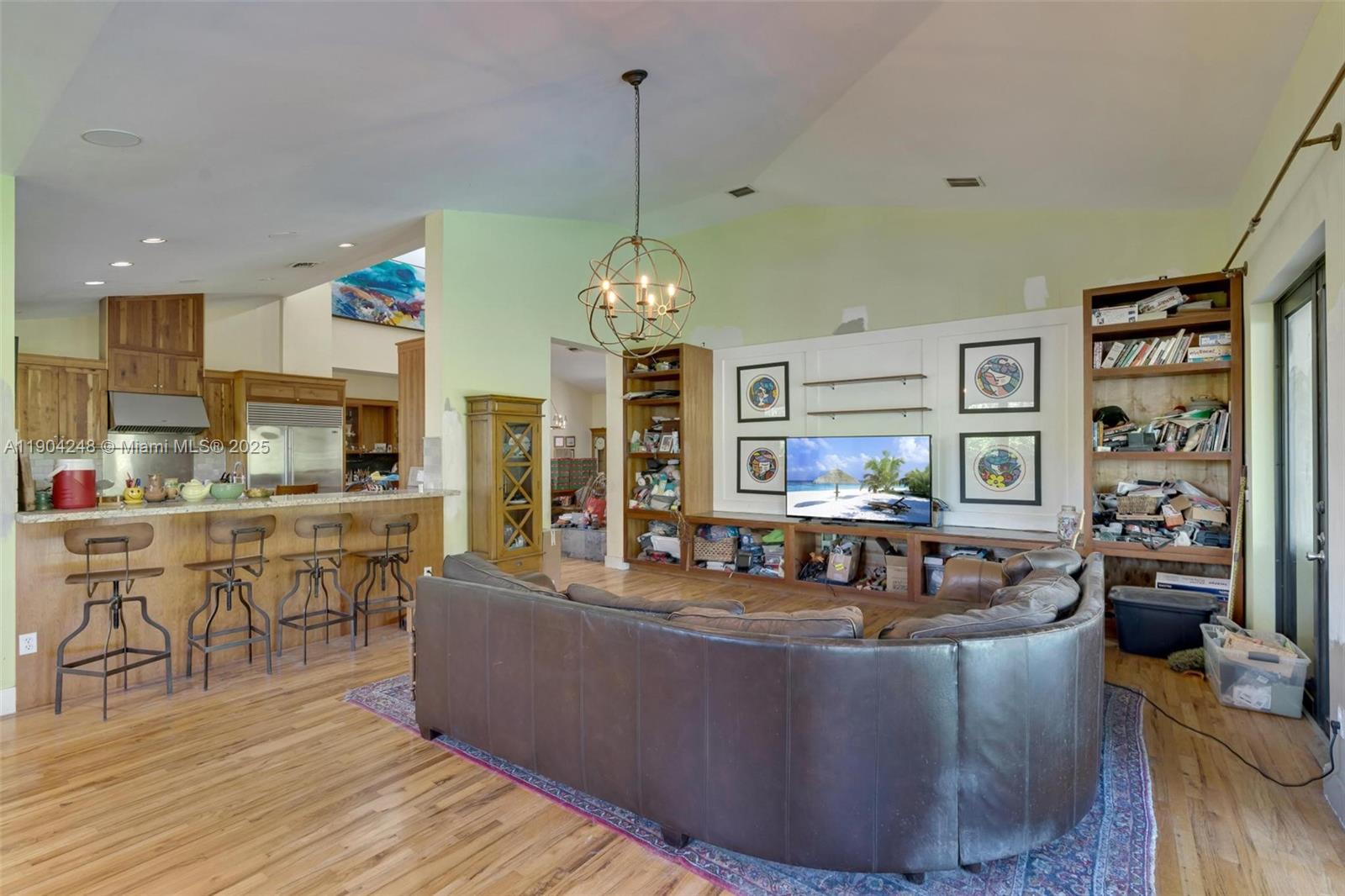 23051 Southwest 153rd Court Miami, FL 33170 - Photo 9 of 33 a living room with fireplace furniture and a wooden floor