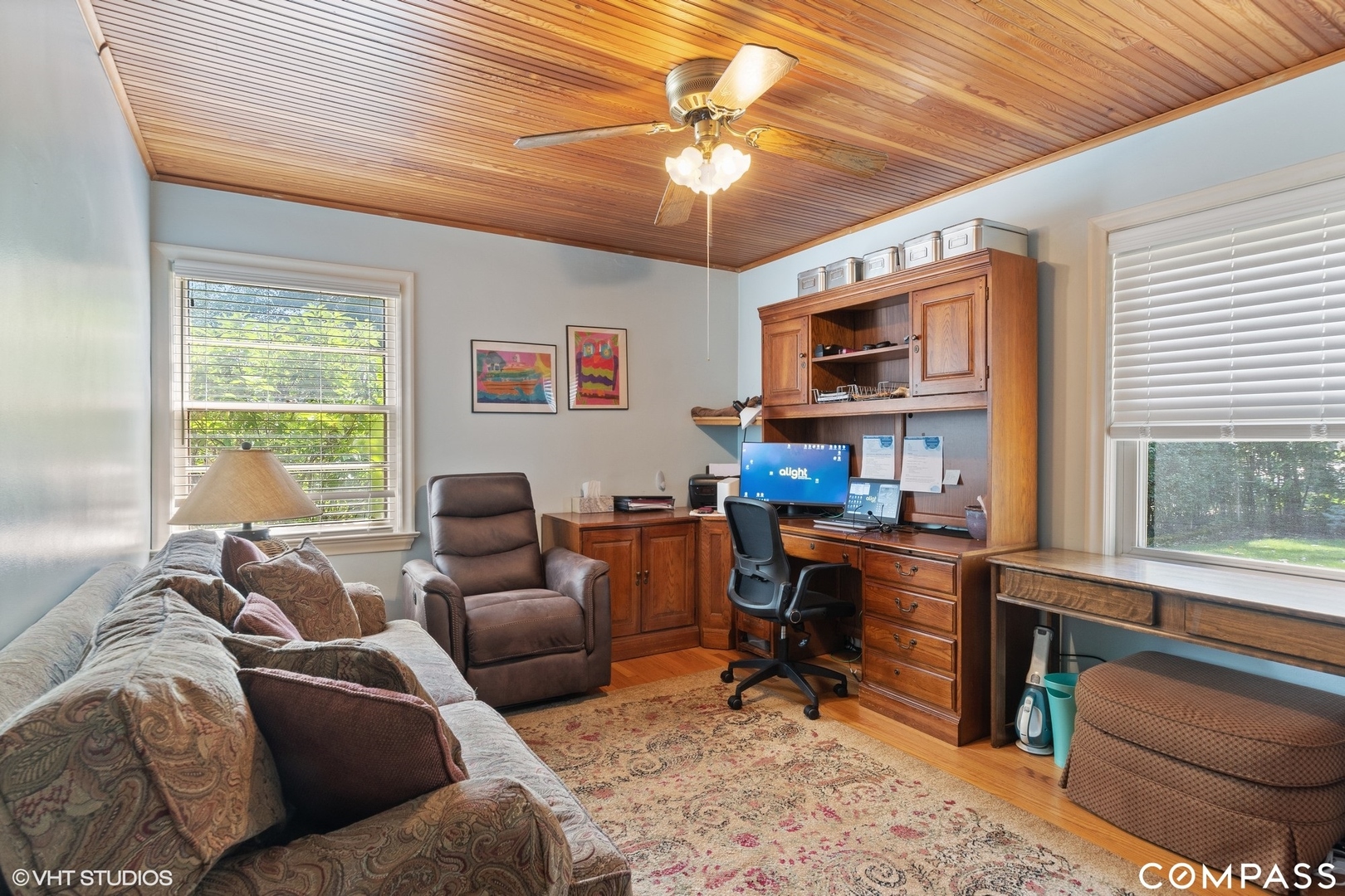706 Deerpath Drive Deerfield, IL 60015 - Photo 5 of 11 a living room with furniture a flat screen tv and a large window
