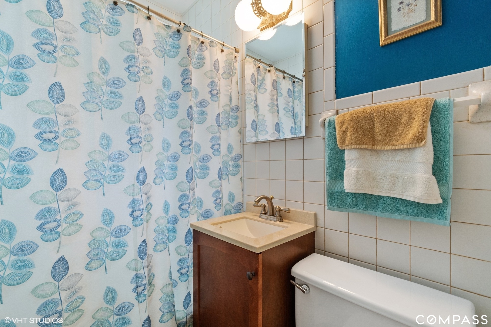 706 Deerpath Drive Deerfield, IL 60015 - Photo 9 of 11 a bathroom with a sink and a toilet