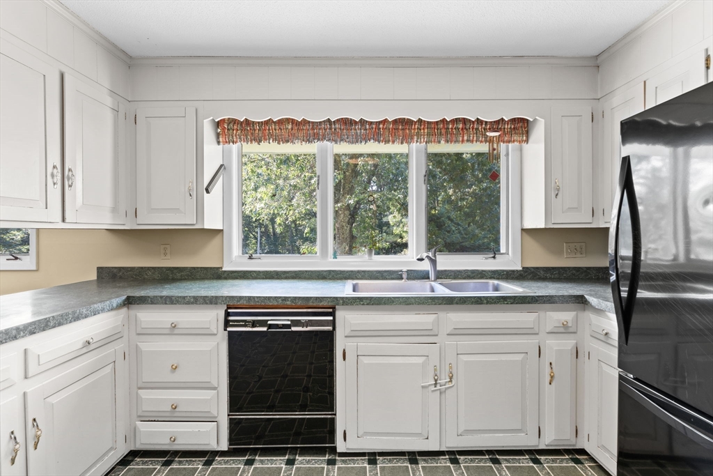 46 Highland Road Boxford, MA 01921 - Photo 14 of 41 a kitchen with appliances cabinets and a sink